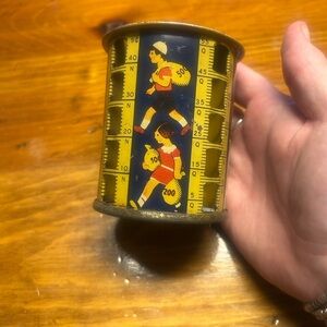 Retro Tin Coin Bank with Nostalgic Design